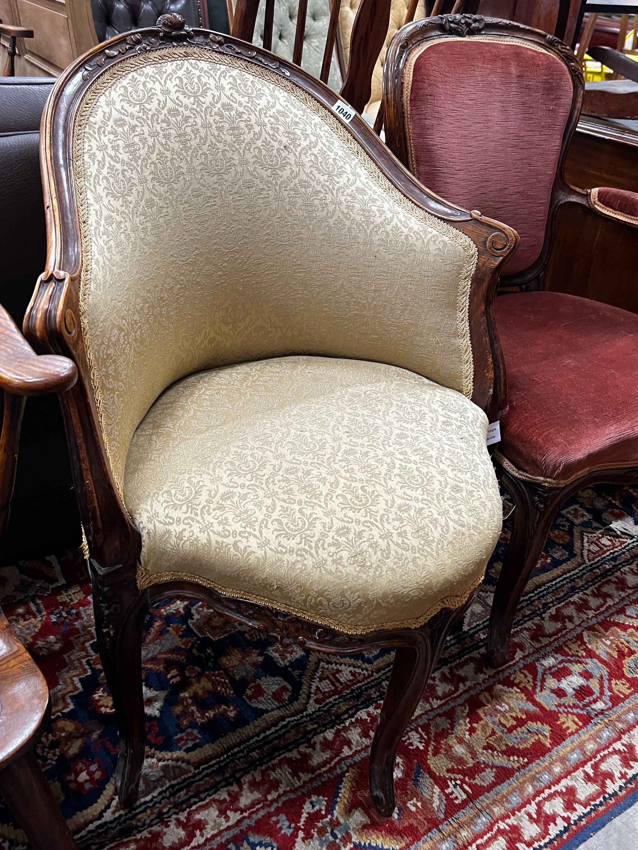 A late 19th century French walnut corner elbow chair, width 65cm, depth 49cm, height 90cm